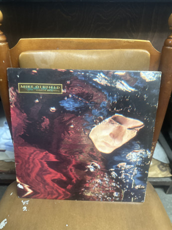 mike-oldfield-earth-moving-big-0